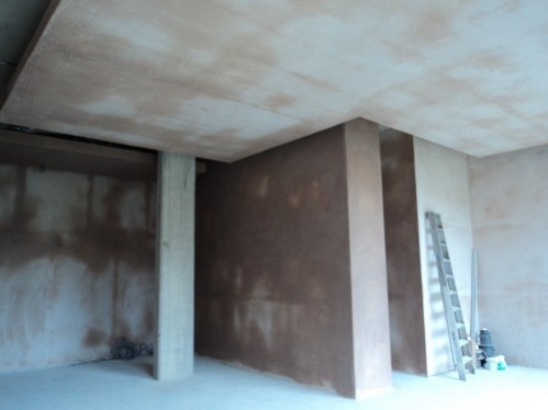 Large scale plastering with feature ceiling.